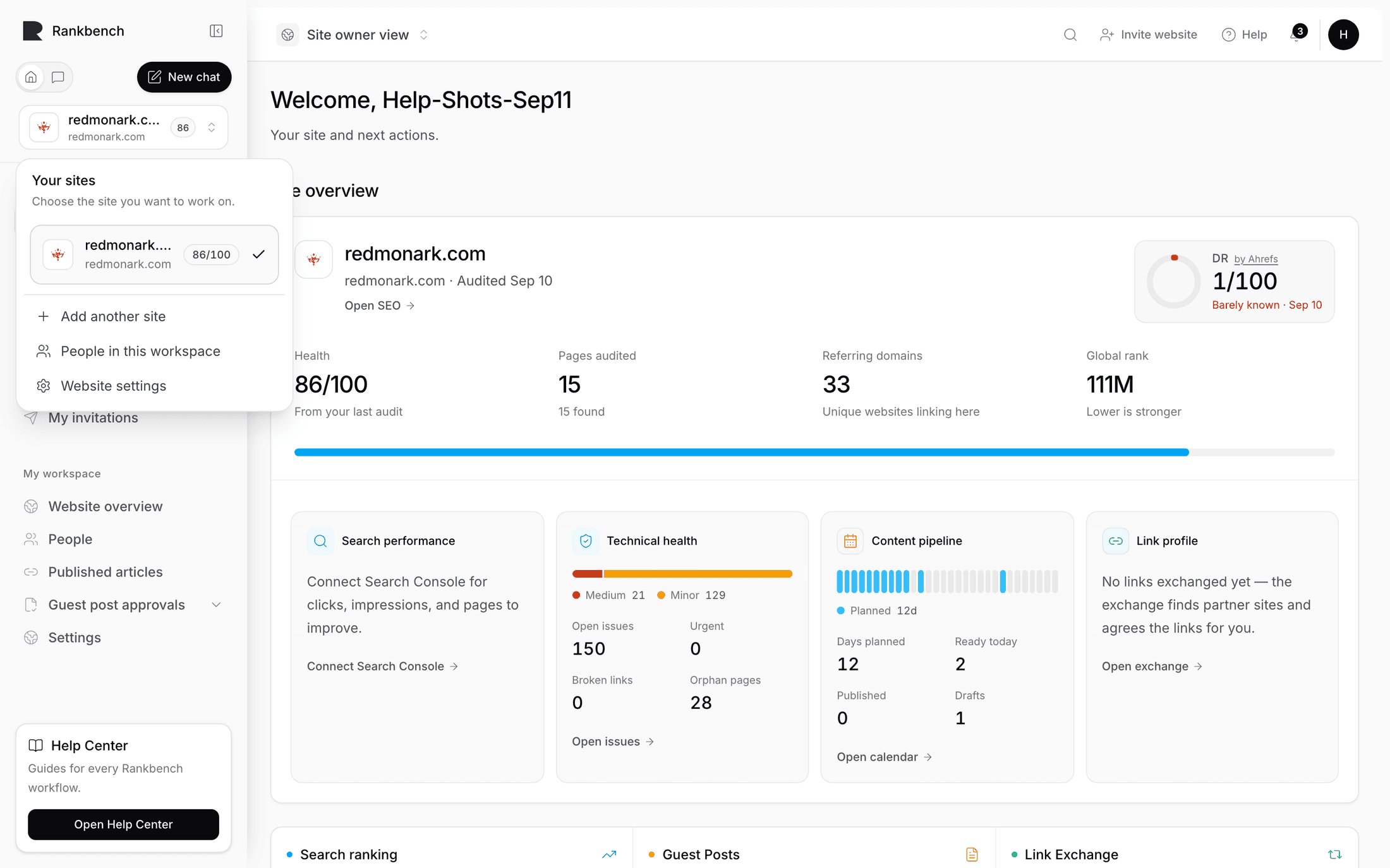 The workspace switcher open under the logo, listing the sites you can work on